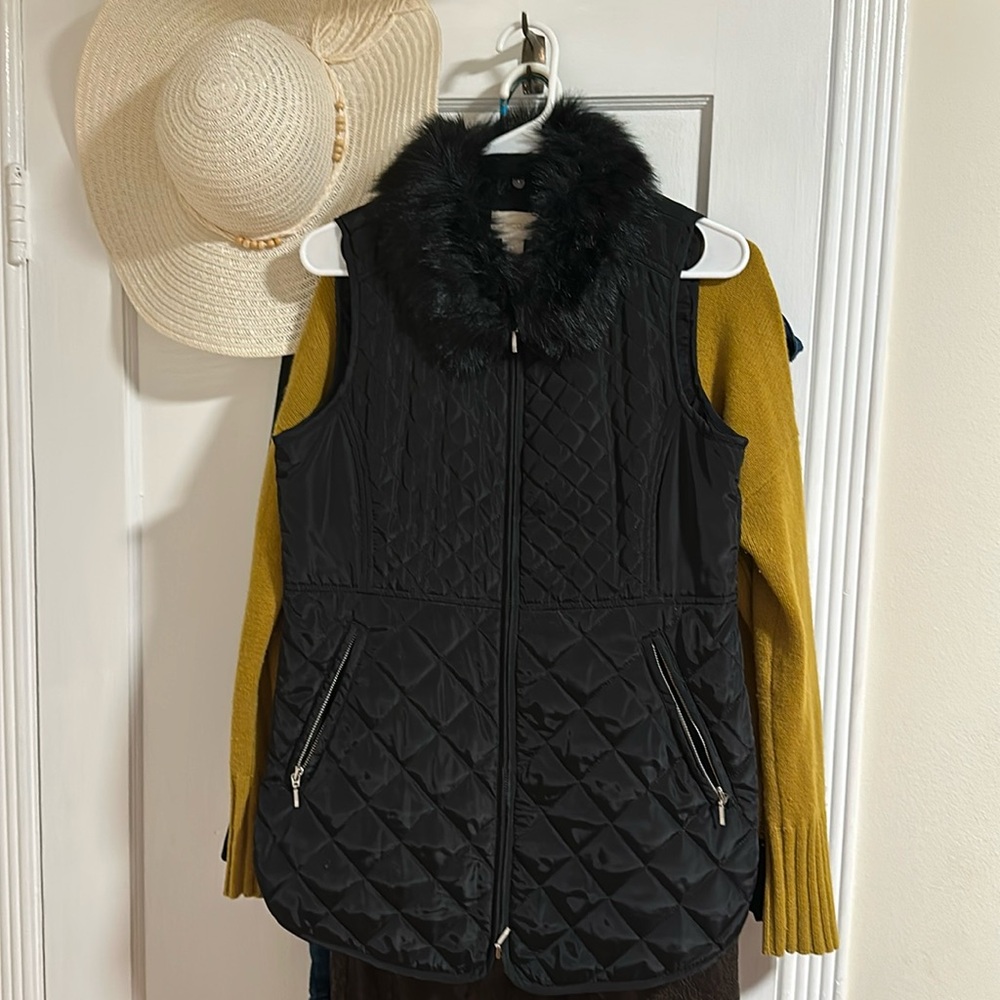 Black puffer vest with faux fur collar